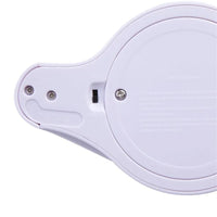 Lampe projecteur arc-en-ciel – dessous de la lampe avec l'interrupteur de mode