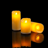 Bougies LED à mèche mobile – 3 bougies allumées, l'une couchée