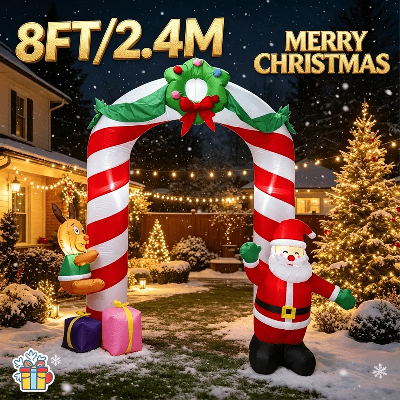 Arche de Noël gonflable avec Père Noël et renne – arche devant une maison illuminée et un sapin de Noël