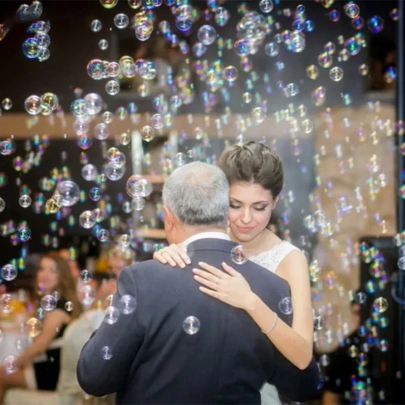 Mini machine à bulles LED RGB – pluie de bulles pendant une danse de mariage