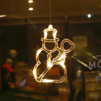 Décoration fenêtre Noël lumineuse à ventouse, 11 motifs, à piles
