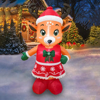 Renne lumineux gonflable en robe rouge – renne gonflable devant une maison illuminée le soir