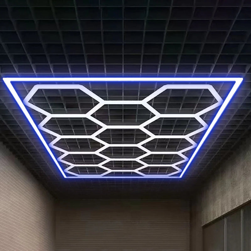 Plafonnier LED 14 hexagones à cadre bleu – contour bleu et hexagones blancs sous un plafond à grille