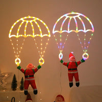 Décoration de fenêtre Père Noël en parachute – vue 6