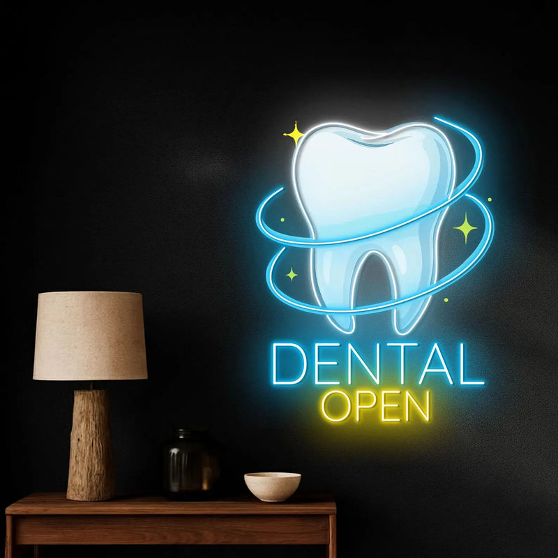 Enseigne néon dentiste DENTAL OPEN – au-dessus d'une console avec une lampe