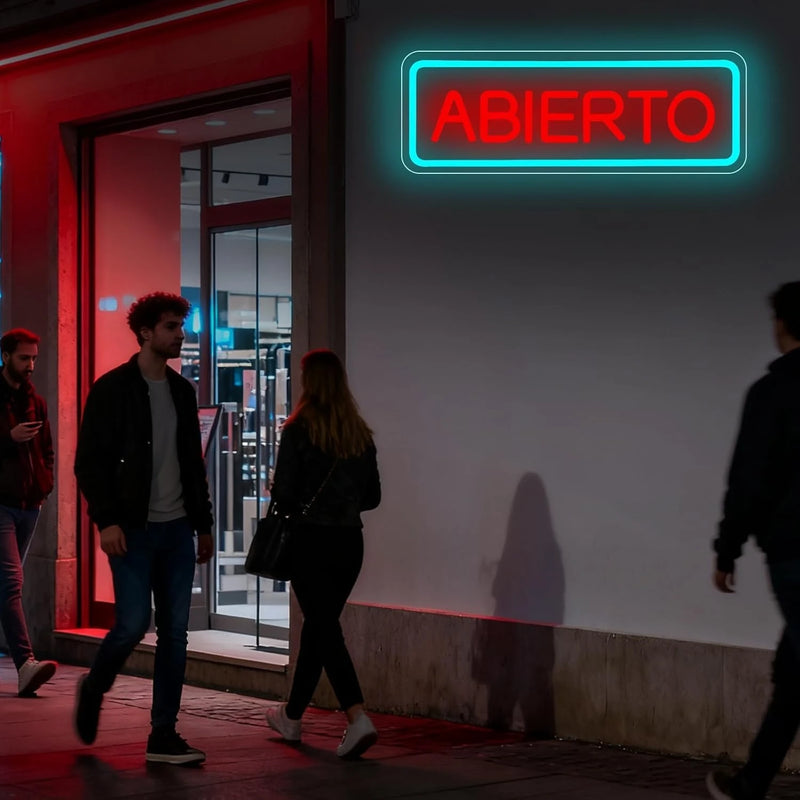 Enseigne néon ABIERTO – en vitrine d'un magasin, vue de rue de nuit