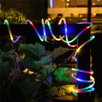 Guirlande LED tube de corde – tube lumineux multicolore en courbes sur un mur