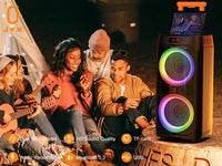 Machine karaoké Bluetooth – colonne lumineuse près d'un feu de camp avec guitare et micros