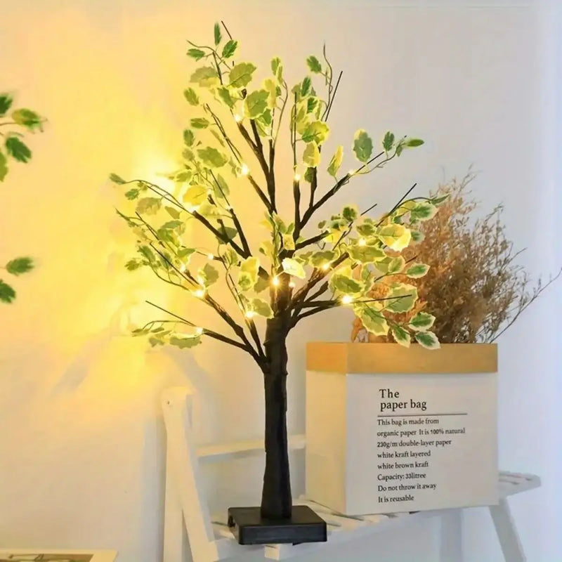 Arbre lumineux bouleau LED 61 cm – arbre à tronc noir allumé près d'un sac en papier, autre vue