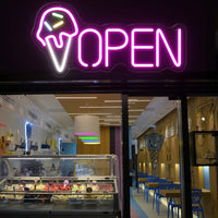 Enseigne néon OPEN cornet de glace – vue de face, à l'entrée d'un glacier