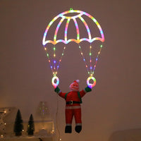 Décoration de fenêtre Père Noël en parachute – vue 14