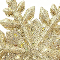 Cimier de sapin lumineux projecteur de flocons – cimier de sapin flocon argenté posé sur une table décorée