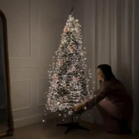 Sapin de Noël pliable pré-décoré lumineux – mise en place du sapin au pied