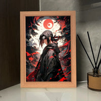 Cadre lumineux Naruto – Itachi devant la lune rouge, cadre allumé