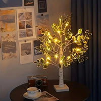 Arbre lumineux bouleau LED 61 cm – arbre à tronc blanc allumé près d'un mur de photos