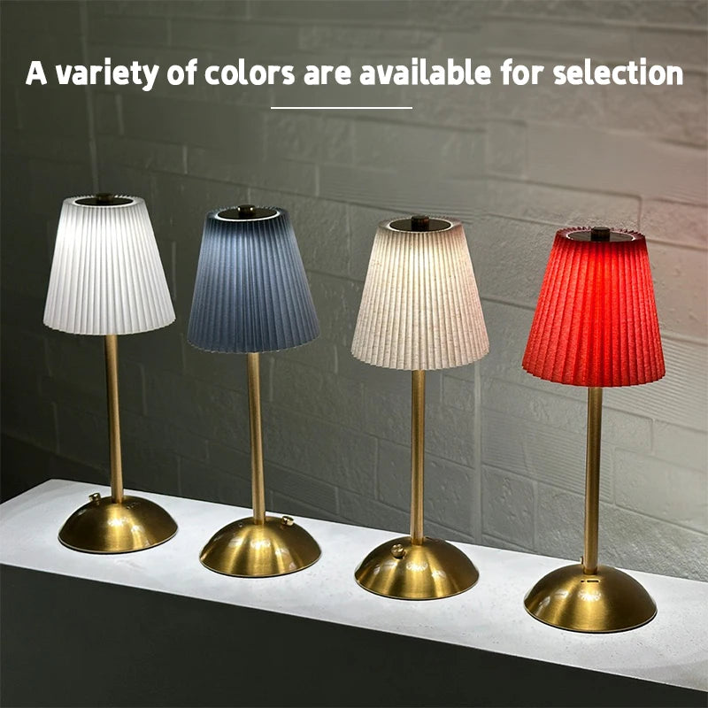 Lampe de table sans fil plissée – quatre coloris d'abat-jour alignés