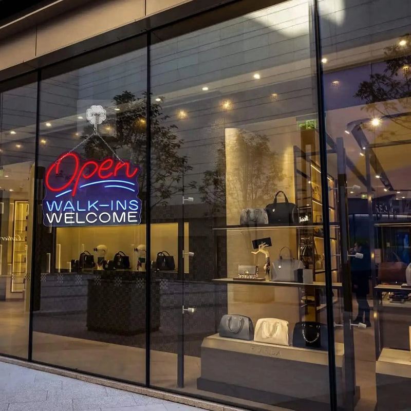 Enseigne néon Open Walk-Ins Welcome – en vitrine d'une boutique