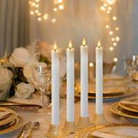 Bougies LED coniques rechargeables – bougies sur une table dressée aux reflets dorés