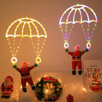 Décoration de fenêtre Père Noël en parachute – vue 15