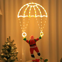 Décoration de fenêtre Père Noël en parachute – vue 18