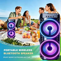 Enceinte Bluetooth lumineuse – enceinte sur une nappe de pique-nique entre amis