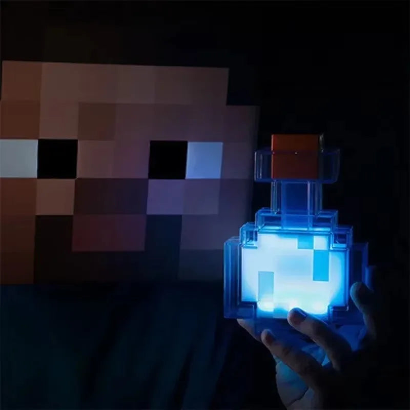 Lampe 3D Minecraft – bouteille de potion allumée en bleu devant un décor pixel