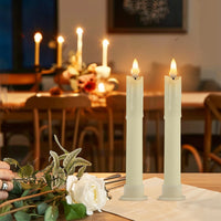Bougies LED coniques – bougies allumées sur une table dressée