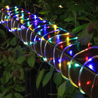 Guirlande LED tube de corde – tube lumineux multicolore enroulé sur une rambarde