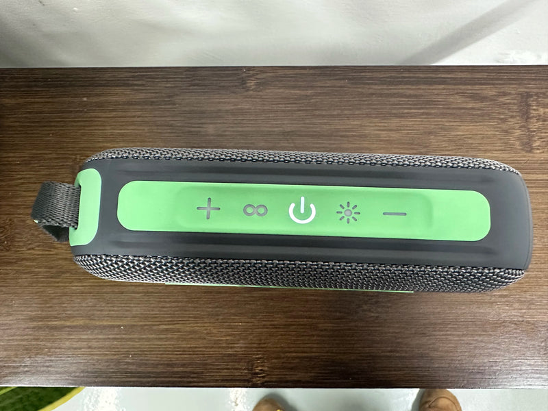 Enceinte Bluetooth lumineuse portable – vue de dessus avec les touches de commande