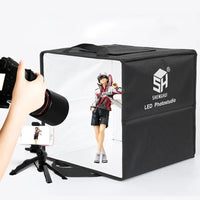 Boîte à lumière photo LED – photo d'une figurine à l'appareil photo