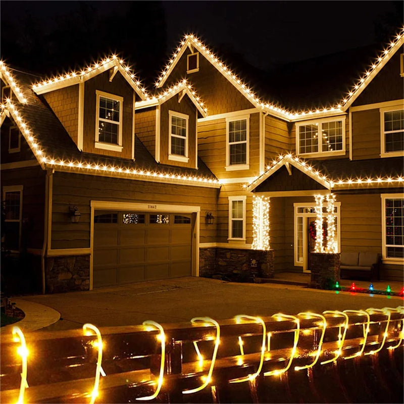Guirlande LED tube de corde – façade de maison dessinée par un tube lumineux blanc chaud