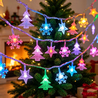 Guirlande lumineuse extérieur Noël à motifs – guirlande multicolore d'étoiles, de flocons et de sapins sur un sapin de Noël