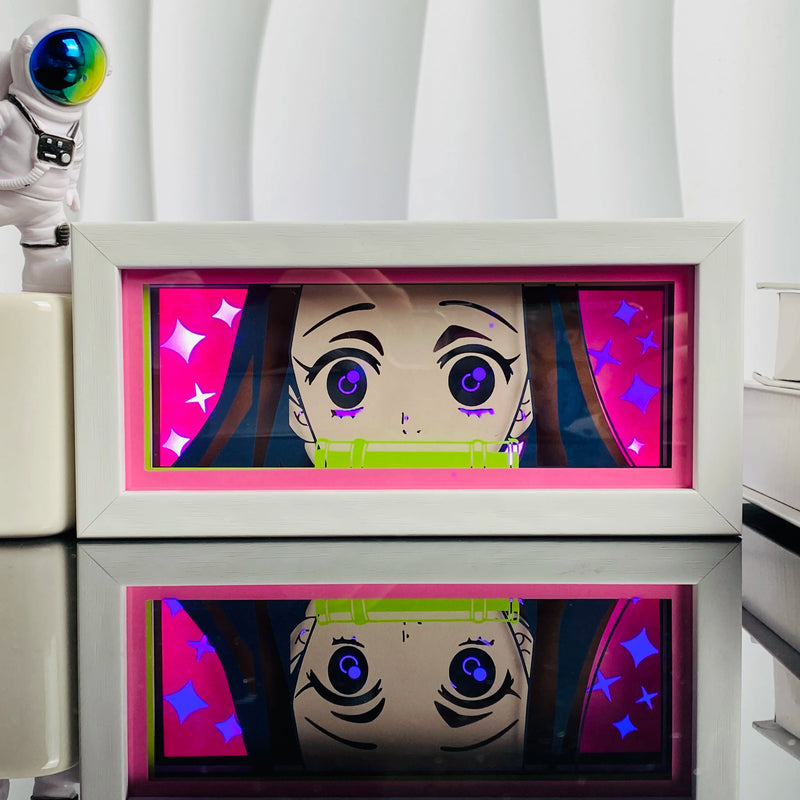 Tableau lumineux LED manga – Nezuko, cadre allumé en rose