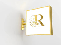 Enseigne drapeau ronde à logo – exemple de logo doré sur un caisson carré