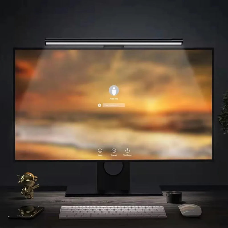 Barre lumineuse pour moniteur – barre allumée au-dessus d'un grand écran, devant un clavier