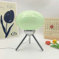 Lampe champignon en verre – globe vert sur trépied chromé, vue de face