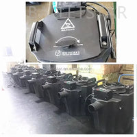Machine à fumée lourde 4000 W – gros plan sur le couvercle à bouton rotatif et rangée de machines alignées