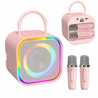 Enceinte karaoké enfant – coloris rose avec ses 2 micros et son compartiment de rangement