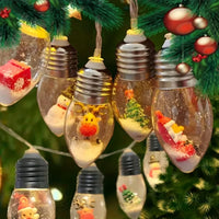 Guirlande sapin lumineuse boules à neige – ampoules à neige accrochées dans un sapin de Noël décoré