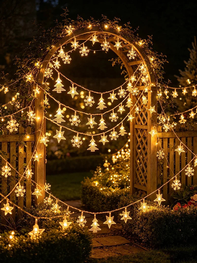 Guirlande lumineuse extérieur Noël à motifs – guirlande de motifs lumineux sur un arc de jardin de nuit