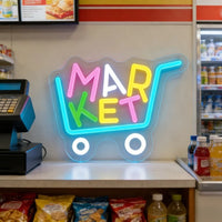 Enseigne néon MARKET chariot de courses – gros plan près d'une caisse