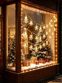 Guirlande lumineuse extérieur Noël à motifs – guirlande de motifs lumineux sur une vitrine de boutique