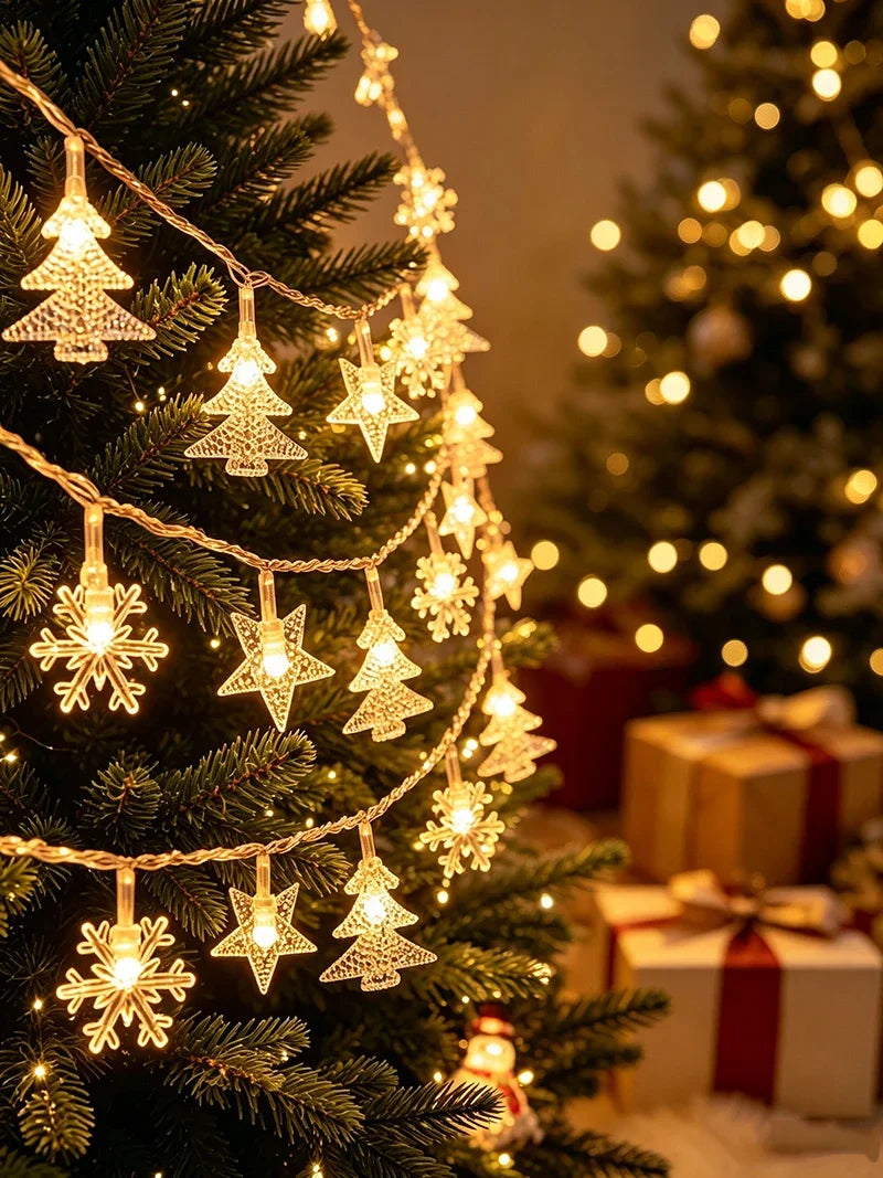 Guirlande lumineuse extérieur Noël à motifs – guirlande d'étoiles, de flocons et de sapins blanc chaud sur un sapin