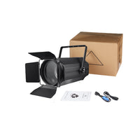 Projecteur LED COB à zoom – un projecteur avec carton, câbles et manuel