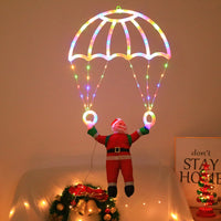 Décoration de fenêtre Père Noël en parachute – vue 17