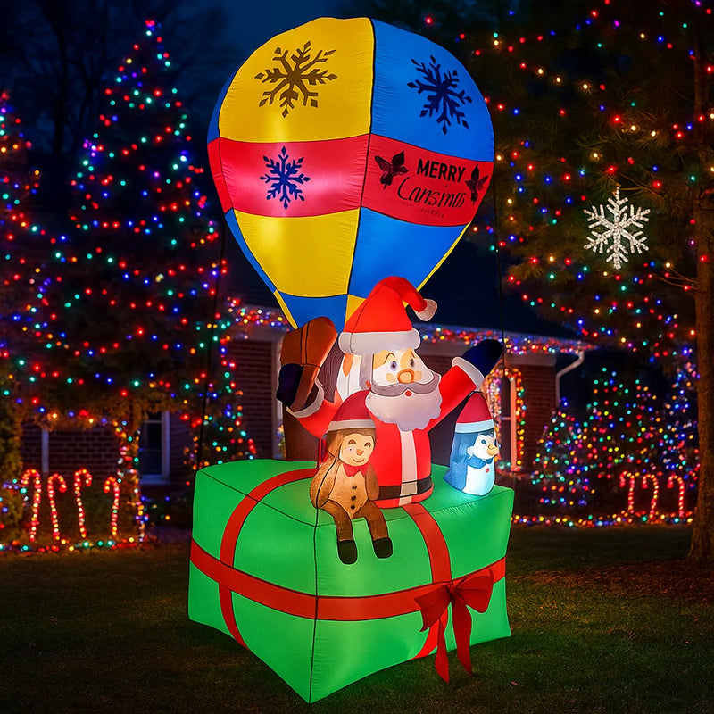 Père Noël gonflable en montgolfière – vue de face de nuit