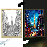 Cadre lumineux Tokyo – motif de la tour, dessin au trait éteint et image en couleurs allumée