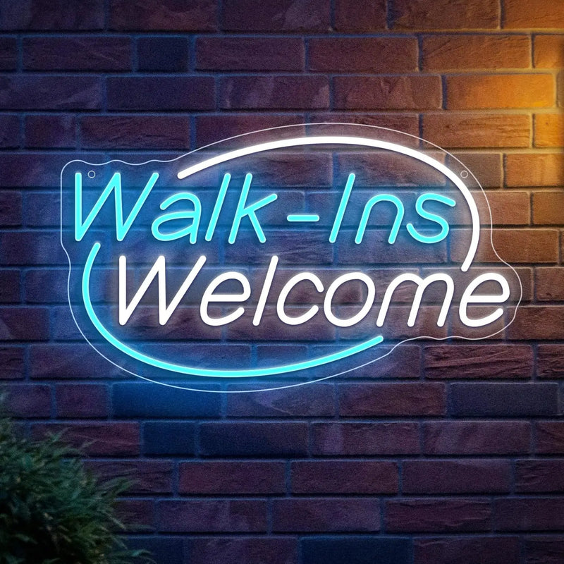 Enseigne néon Open Walk-Ins Welcome – modèle Walk-Ins Welcome ovale bleu et blanc sur mur de brique
