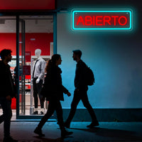 Enseigne néon ABIERTO – au mur à côté de l'entrée d'un magasin