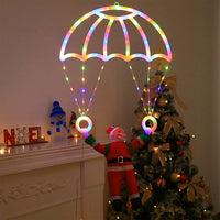Décoration de fenêtre Père Noël en parachute – vue 4